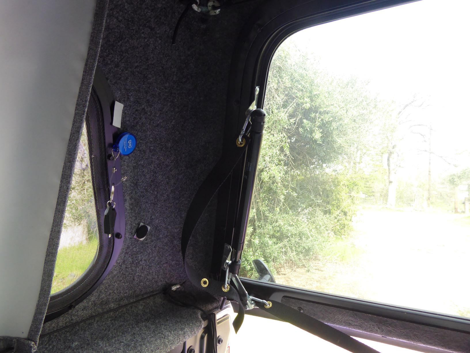 Camper Updates Door limiting strap.JPG