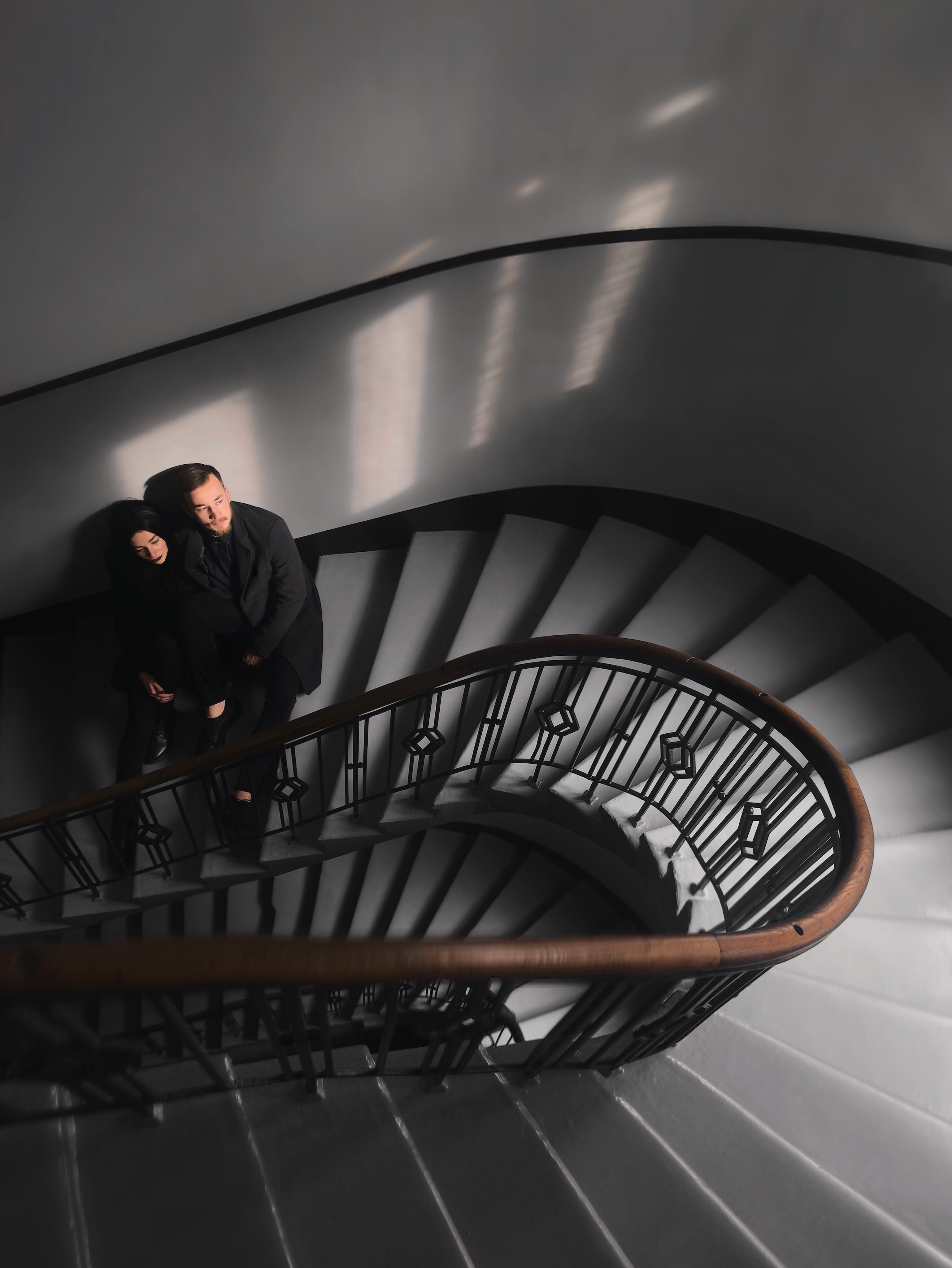 Canva - Woman and Man Standing on Stairs.jpg