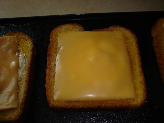 Cheese starts to melt.JPG