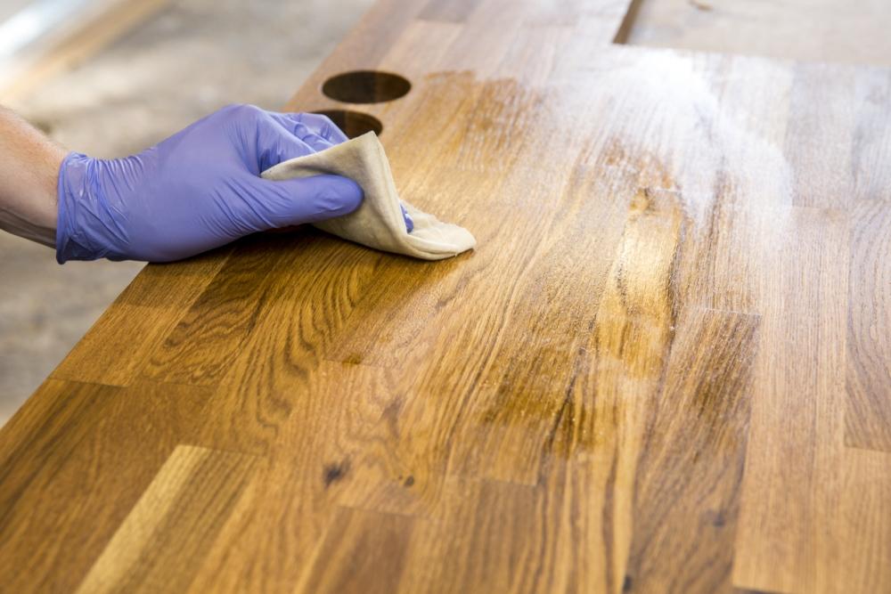 Cleaning-wood-furniture-with-mineral-oil.jpg