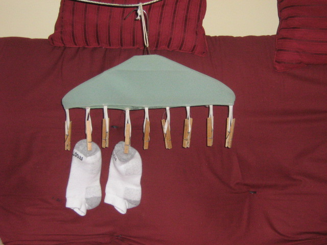 Clothespin hanger with socks.JPG