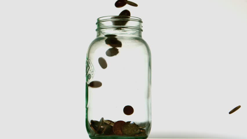 Coins falling into jar.jpg