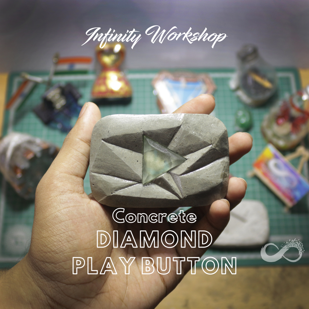 Concrete diamond play button.png