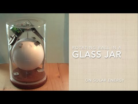 Continuously rotating sphere in a glass jar