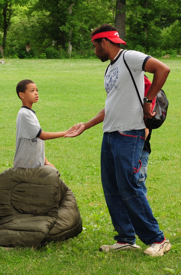 Counselor greeting camper - boy.jpg