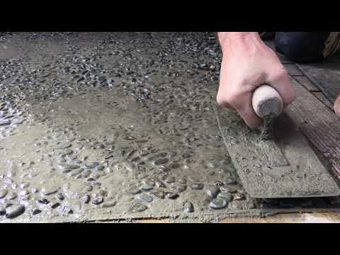 Creating Exposed Aggregate Path - trowelling in pebbles part 2