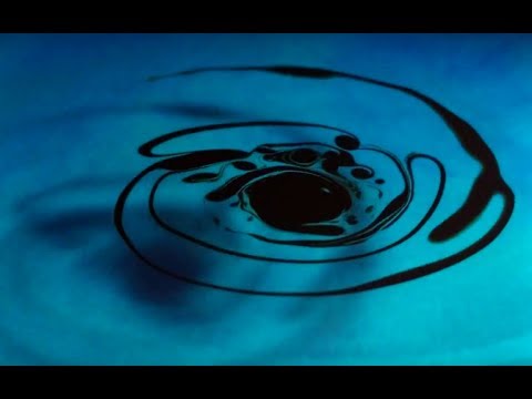 Creating Ferrofluid Vortices using Spinning Magnetic Field