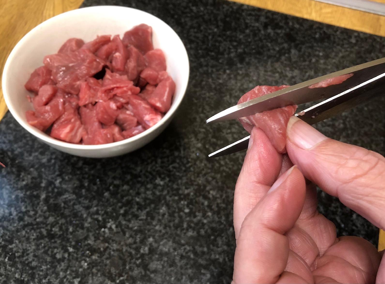 CuttingLambwithScissors.jpg