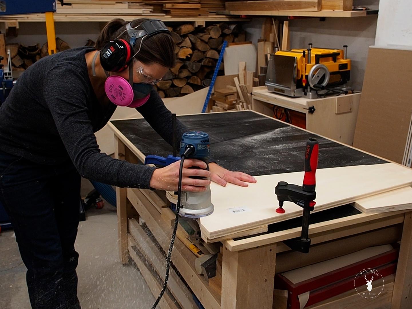 DIY Standing Desk Converter - cutting curve on base with pattern bit.jpg