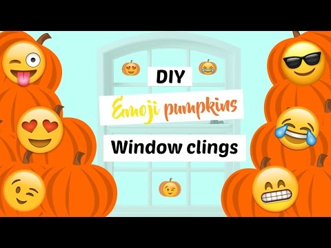 DIY emoji pumpkins window clings using hot glue