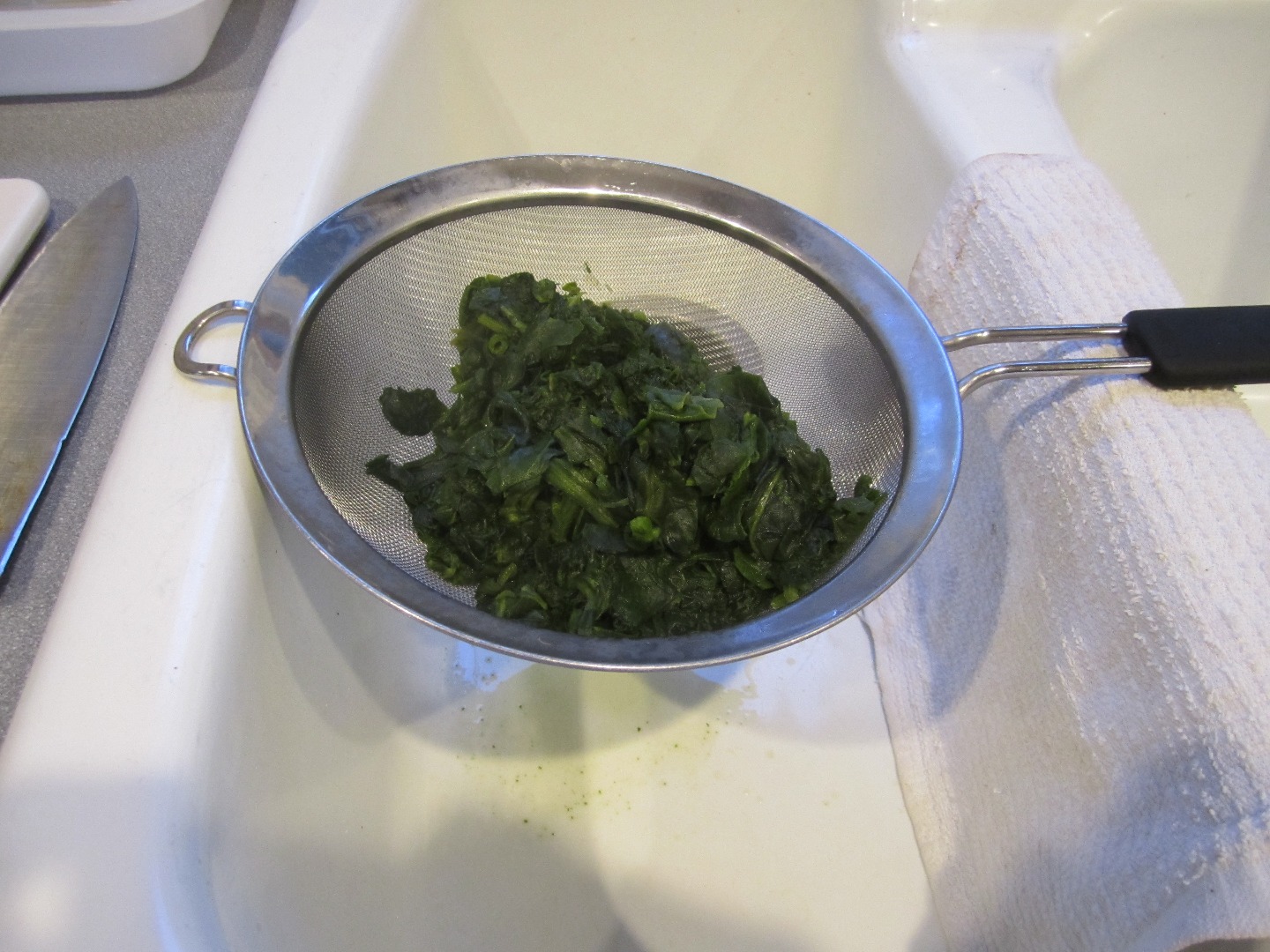 Draining Spinach.JPG