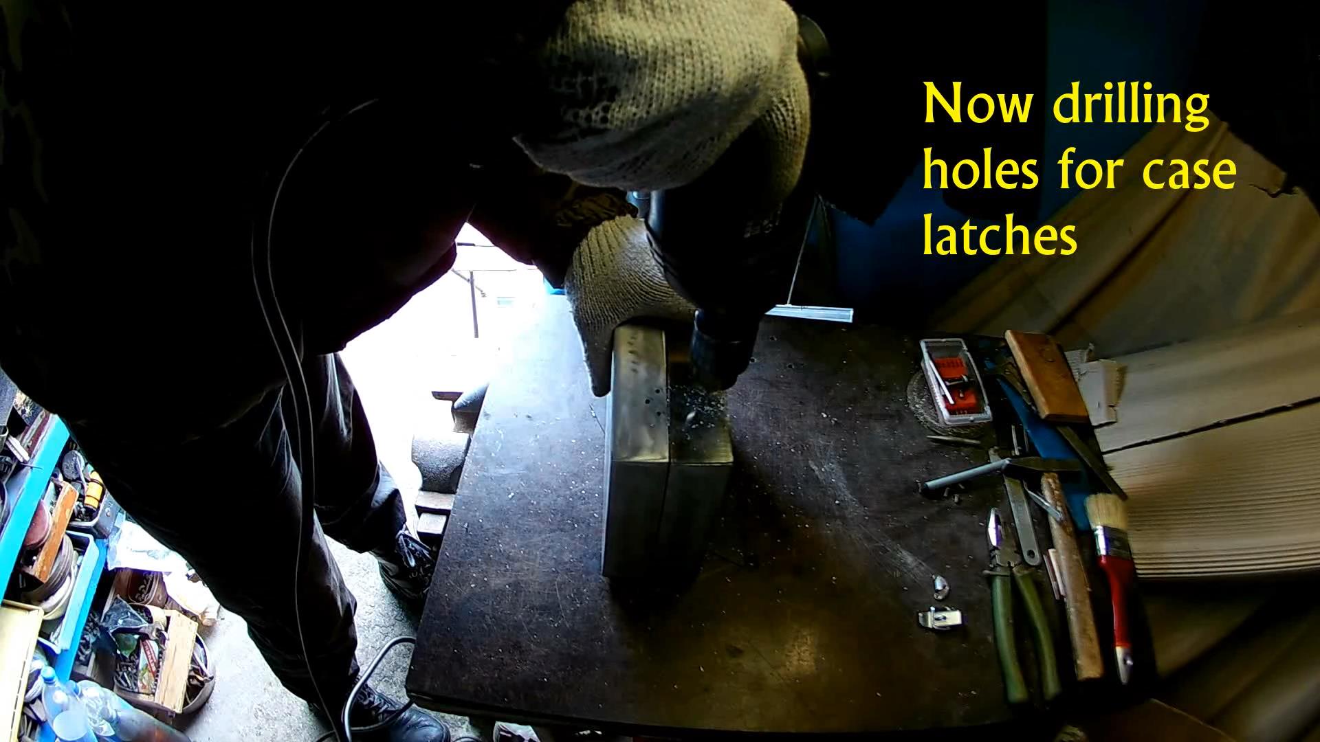 Drilling holes for case latches.jpg