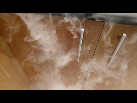 Dry Ice placed into a sink of warm water