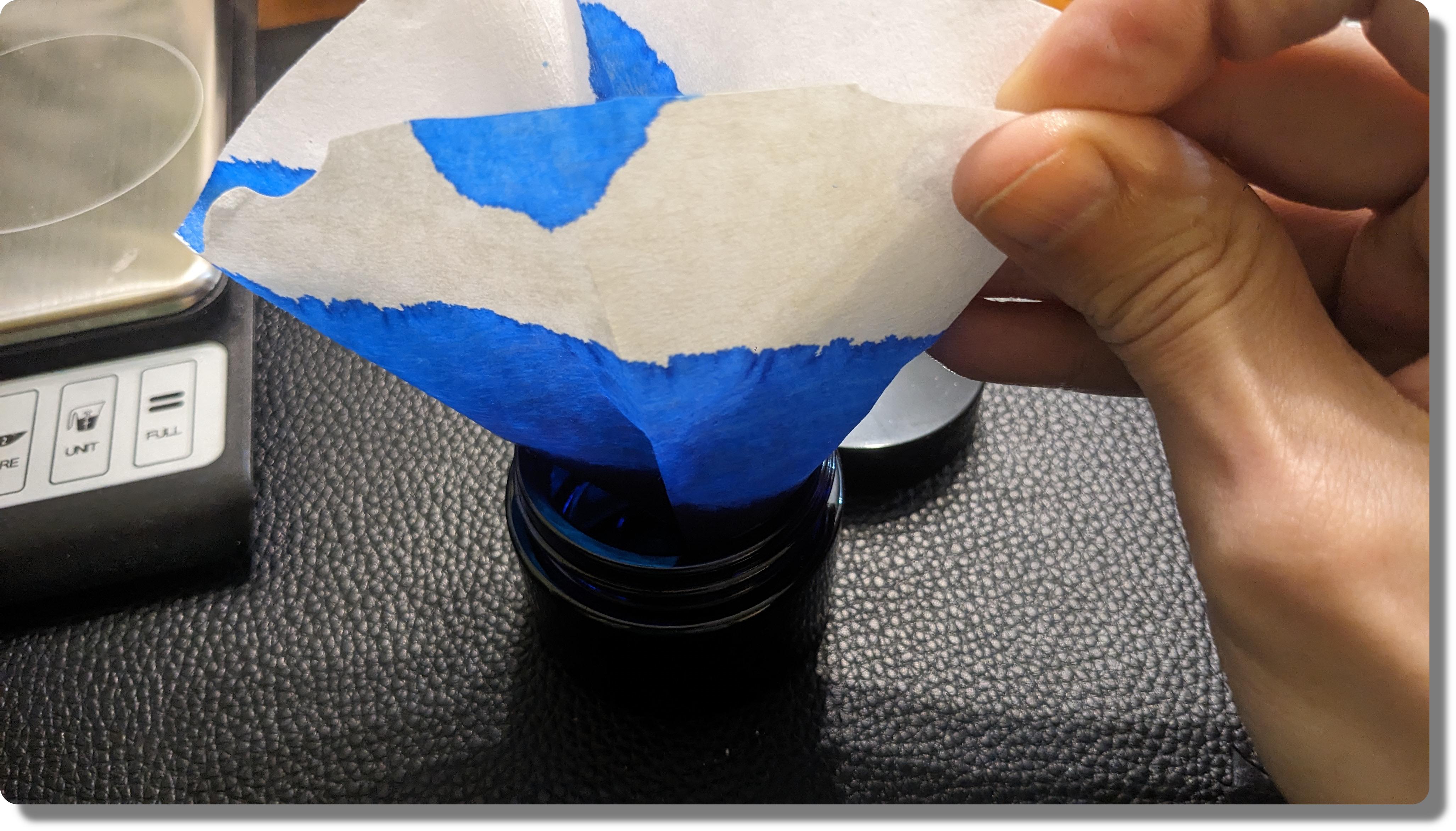 Filtering the fountain pen ink through a coffee filter (part 2, rounded corners).jpg