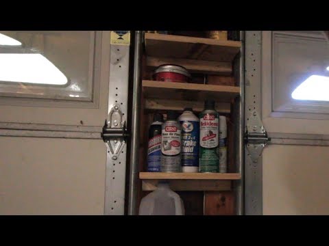 Floating Shelves Between Garage Doors Made From Scrap Wood