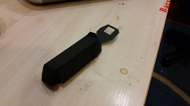 Foldable public lab spectrometer cut using silhouette portrait.