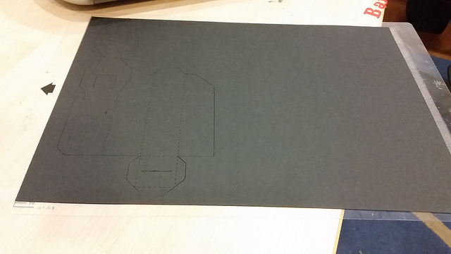 Foldable public lab spectrometer cut using silhouette portrait.