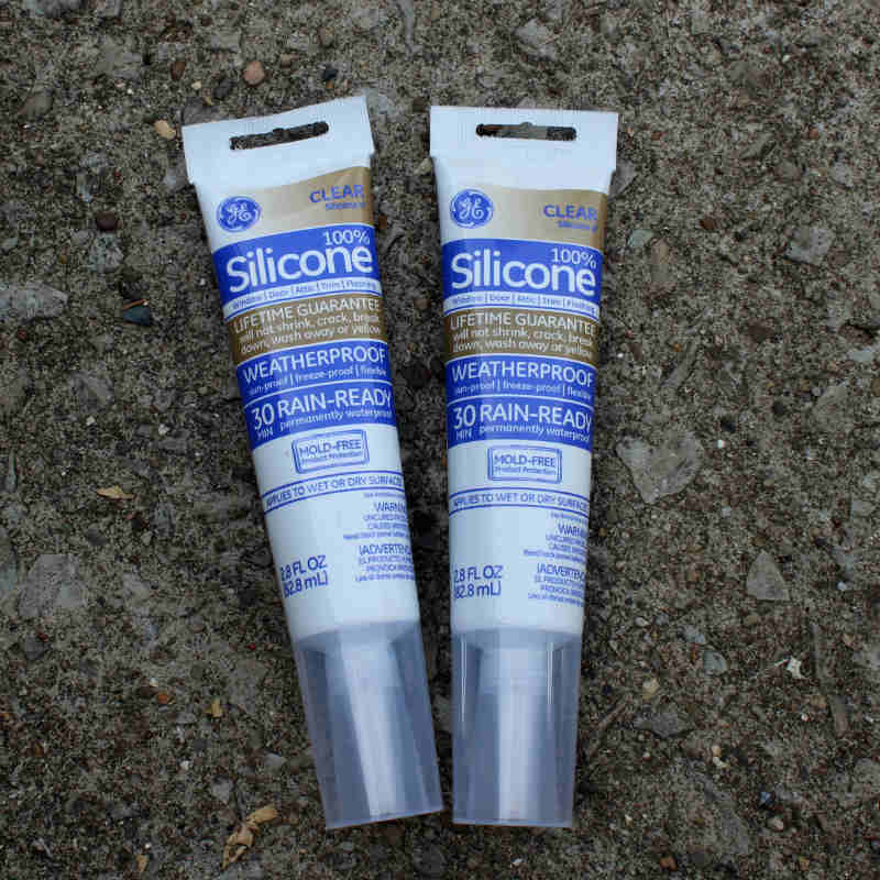 GE Clear Silicone II Caulk to adhere glass pieces.jpg