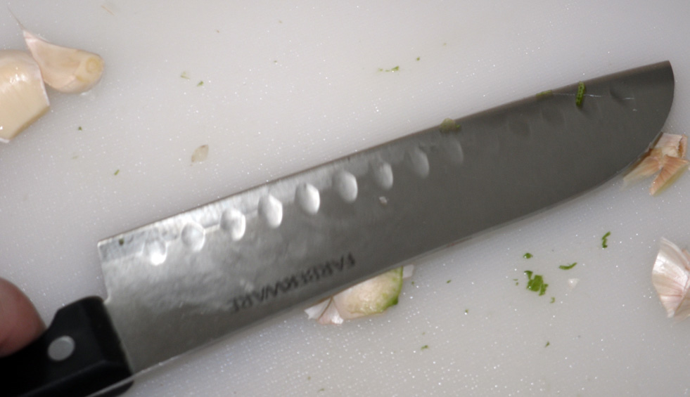 Garlic under Knife Blade.jpg