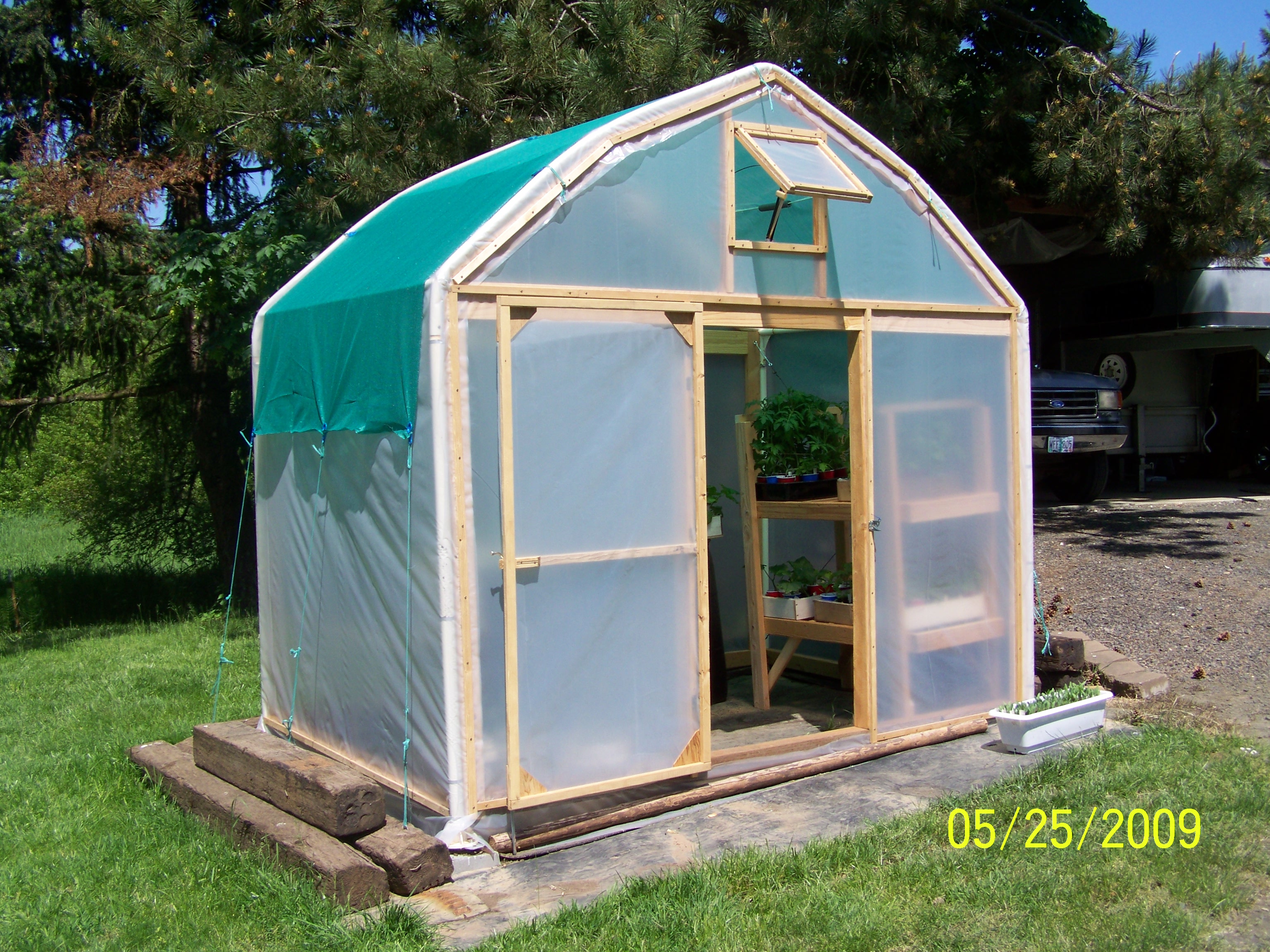 Greenhouse from carport.JPG