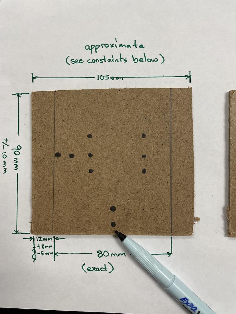 Holes marked in crossover board.JPG