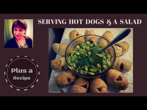 Hot Dogs and Avocado Salad Served with a Style