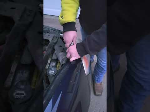 How to Change a Headlight bulb in a Chevy Impala