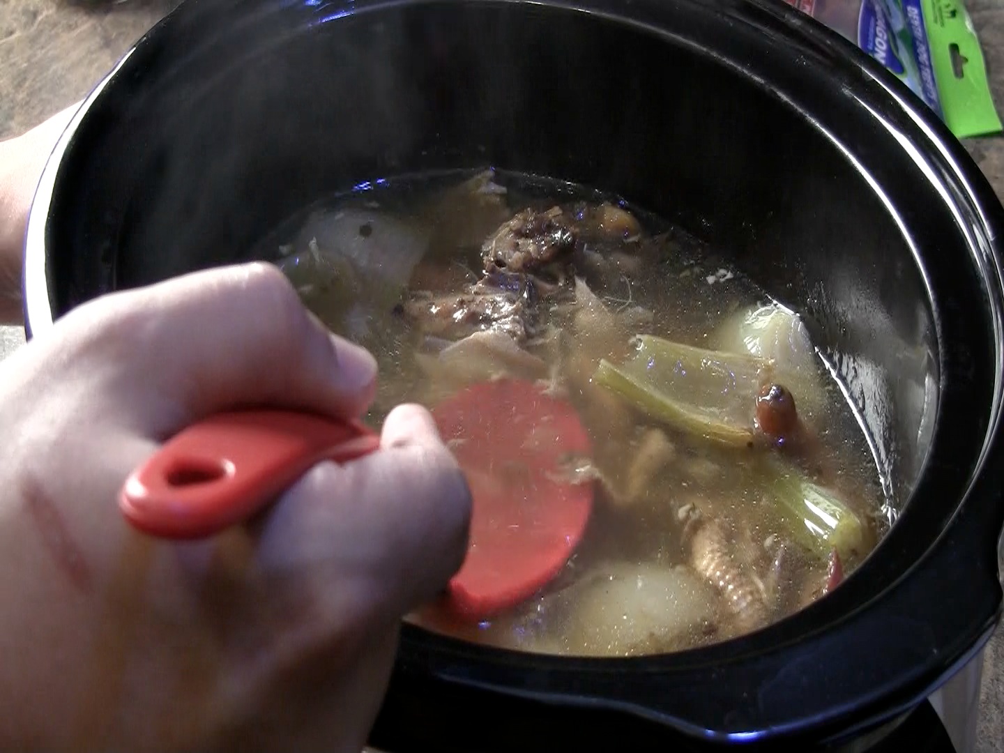 How to Make Homemade Chicken Stock Recipe for Chicken Stock Accented with Fresh Rosemary and Thyme Great for Preppers 1.jpg