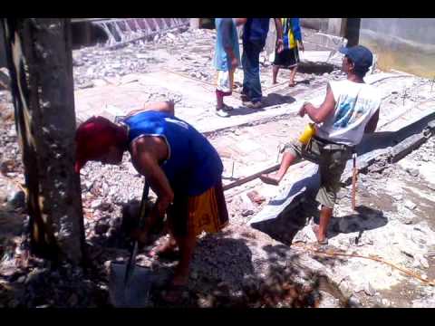 How to build a house in Philippines clip 1 Demolishing the old house.