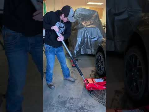 How to jack up car and remove tire.