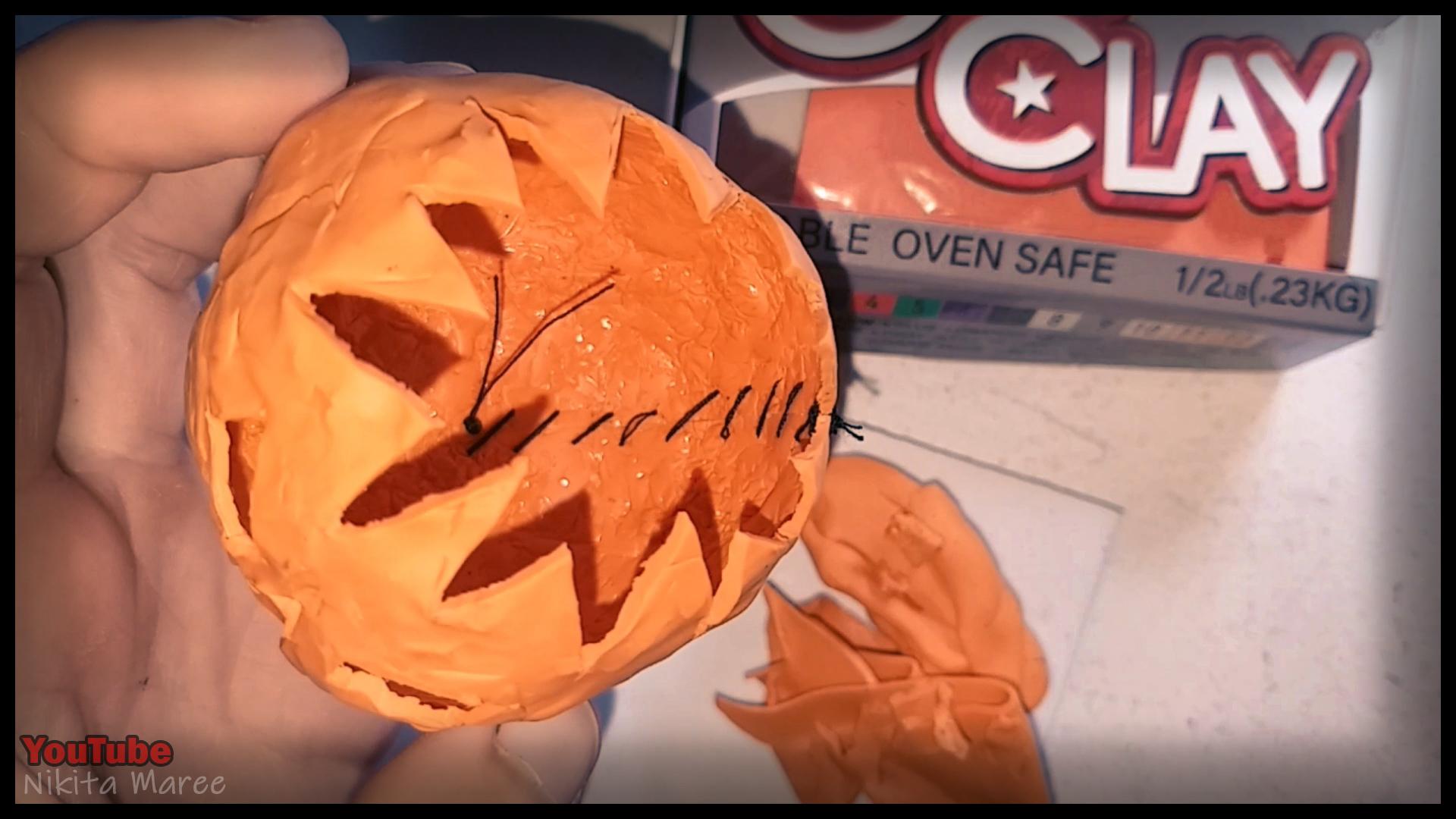 How to make a Jack o'lantern. Polymer clay tutorial. Sculpting a pumpkin out of clay. Halloween Craft.  (14).jpg
