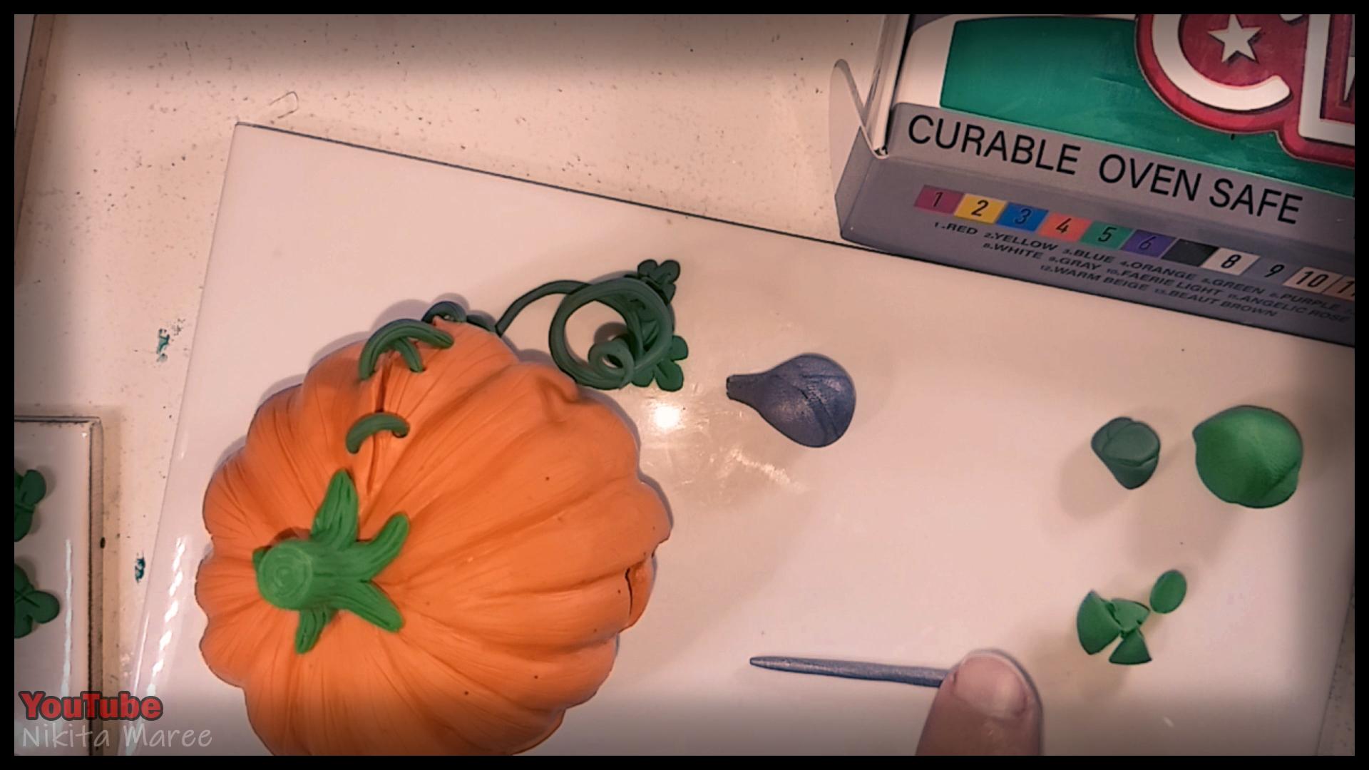 How to make a Jack o'lantern. Polymer clay tutorial. Sculpting a pumpkin out of clay. Halloween Craft.  (60).jpg