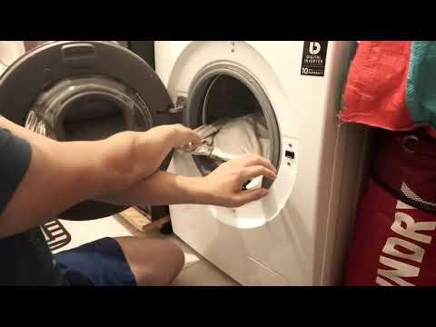 How to pull out laundry from a washing machine