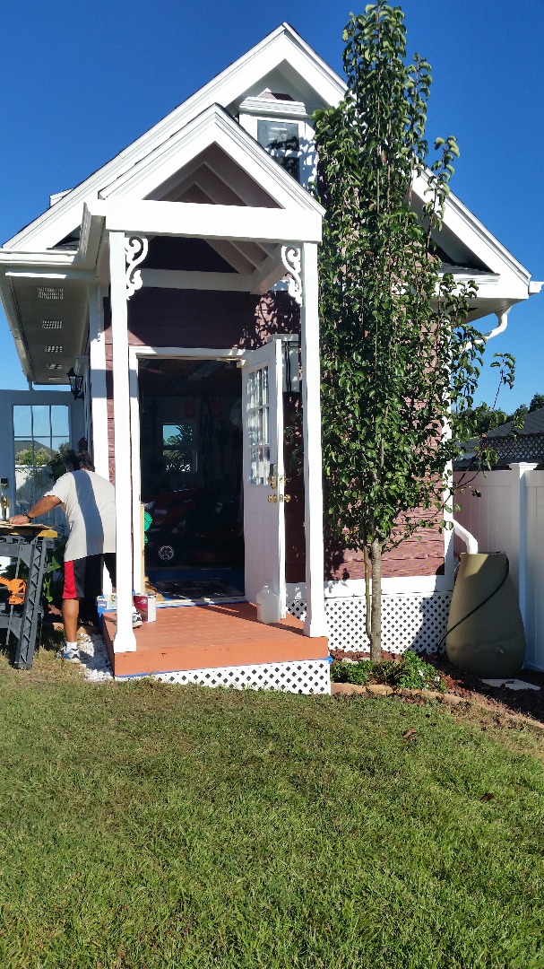 IMG-20151030-taping porch for painting.jpg