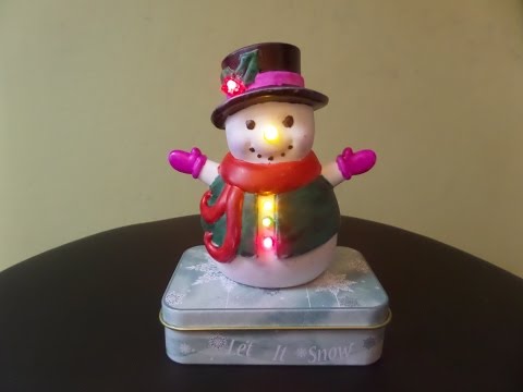 Illuminating Vinyl Holiday Character