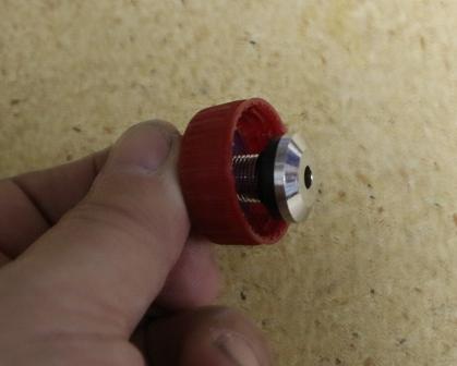 Insrt tire valve into cap.JPG