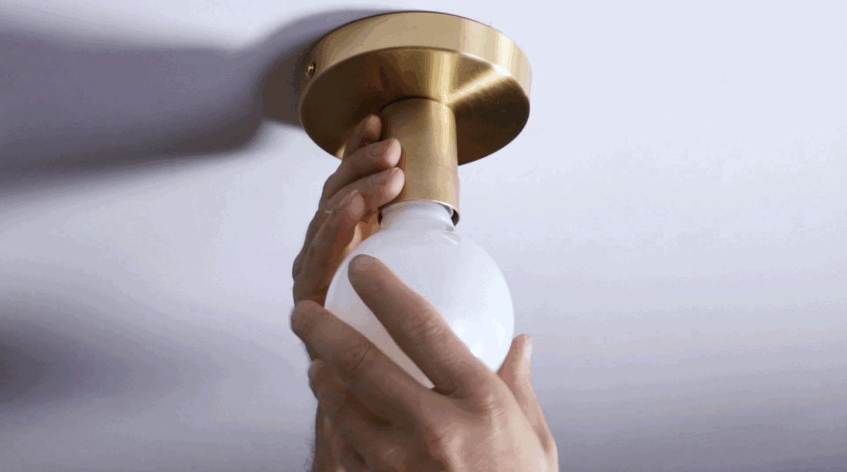 Installing a flush mount fixture - step 4 - screw in light bulb.gif