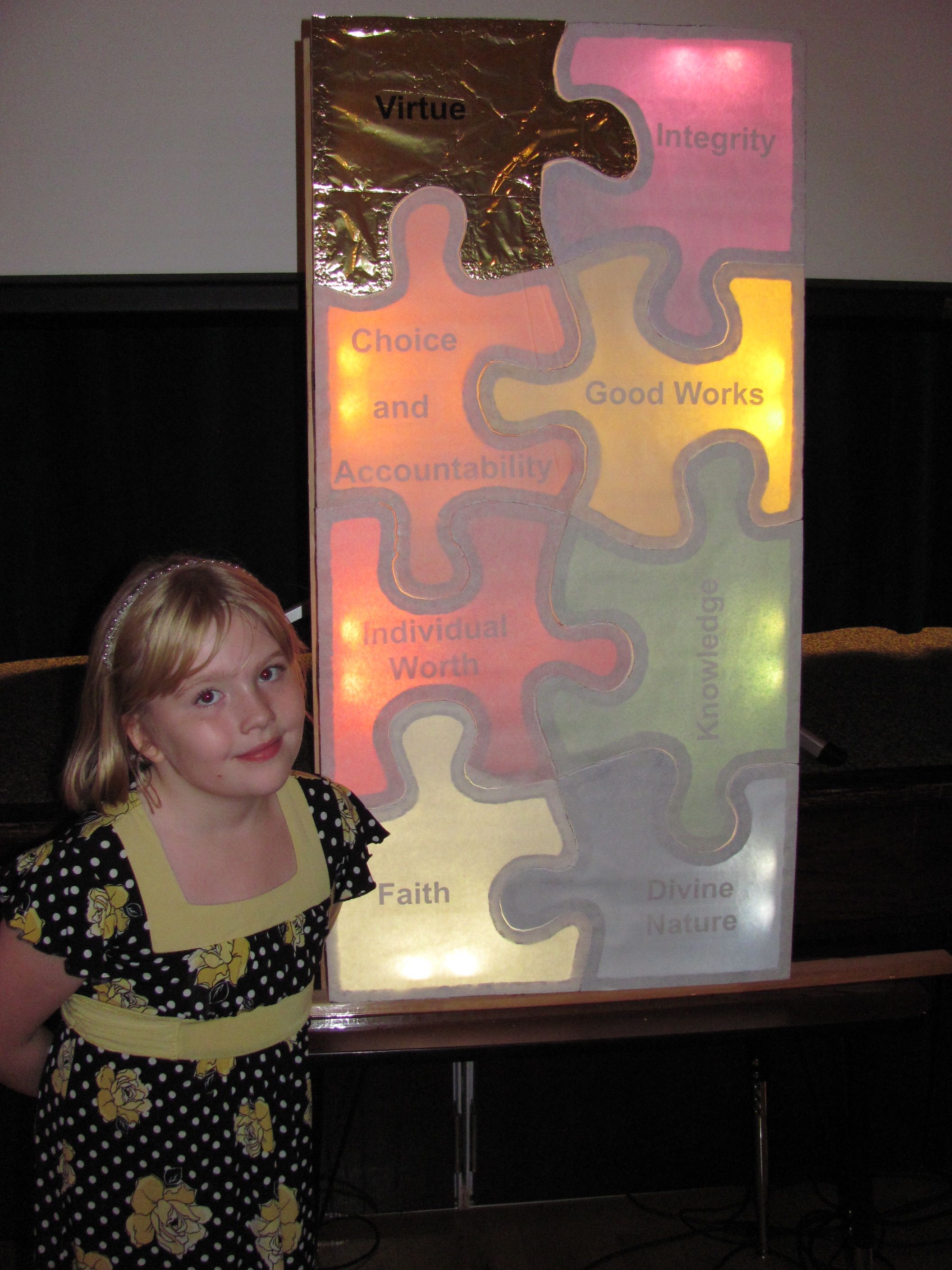 Jackie, age 8, with YW puzzle.jpg