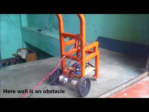 Joystick Controlled Wheelchair Aided With Obstacle Tracker