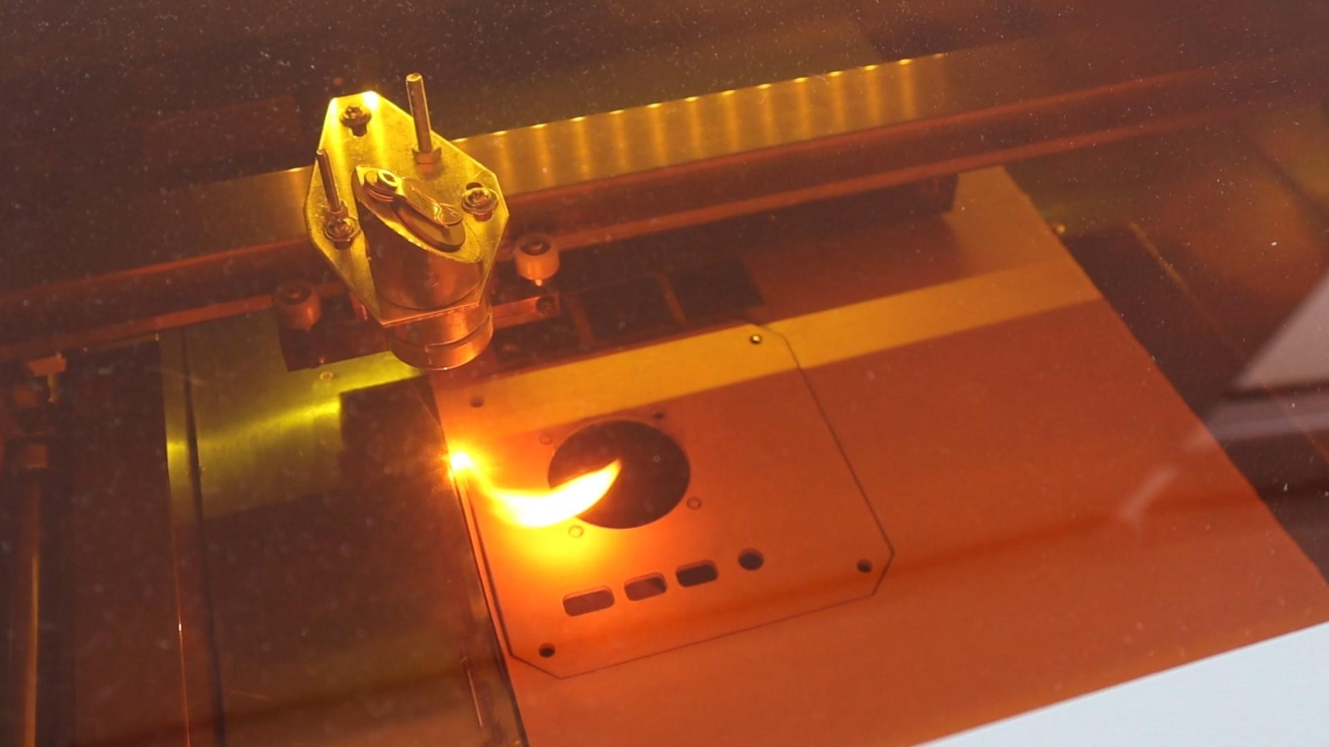 Laser Cutting The Side Profiles.jpg