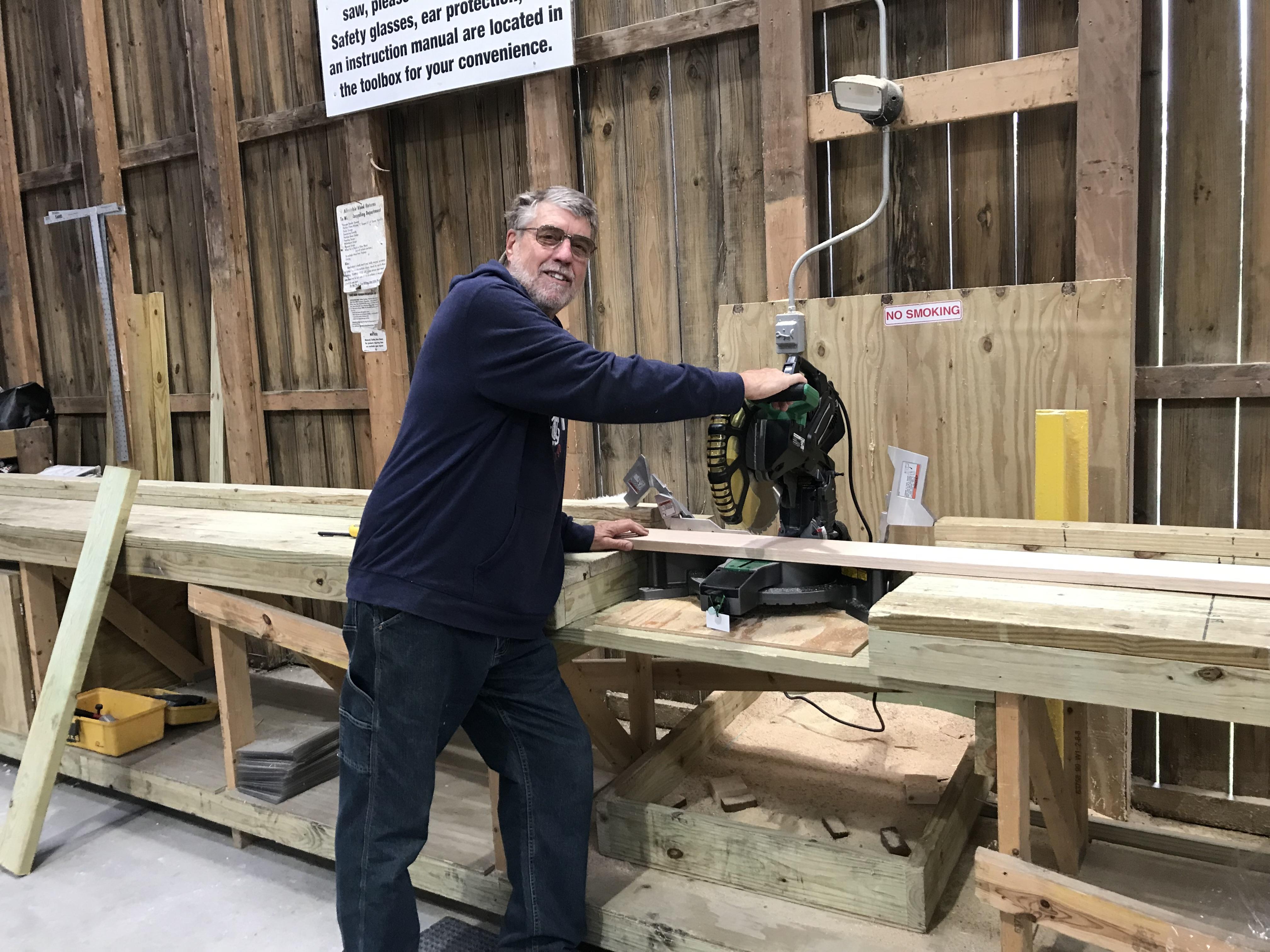 Menards Mike Using Self-Serve Miter Saw.JPG