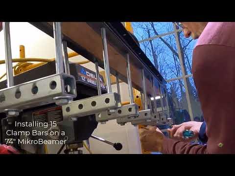 Mounting a 74 Inch MikroBeamer and 15 Clamps to Scaffold