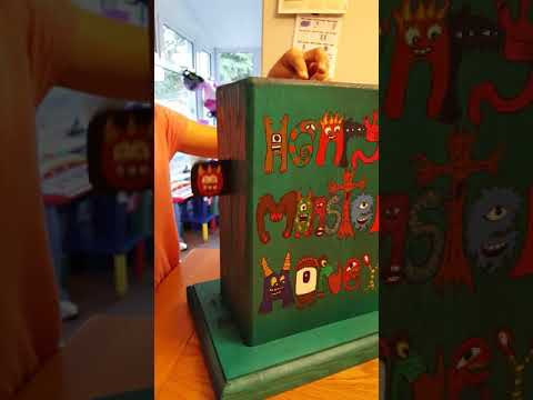 Moving monster money box