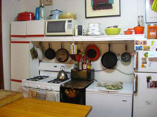 My Kitchen Storage Shelf with my Cabinets from the Alley