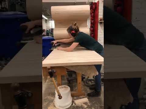 Noodle Desk -- Sanding seam and glue and hammering in dowels in screw holes