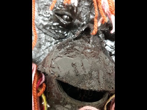 Orangutan in bitumen and yarn