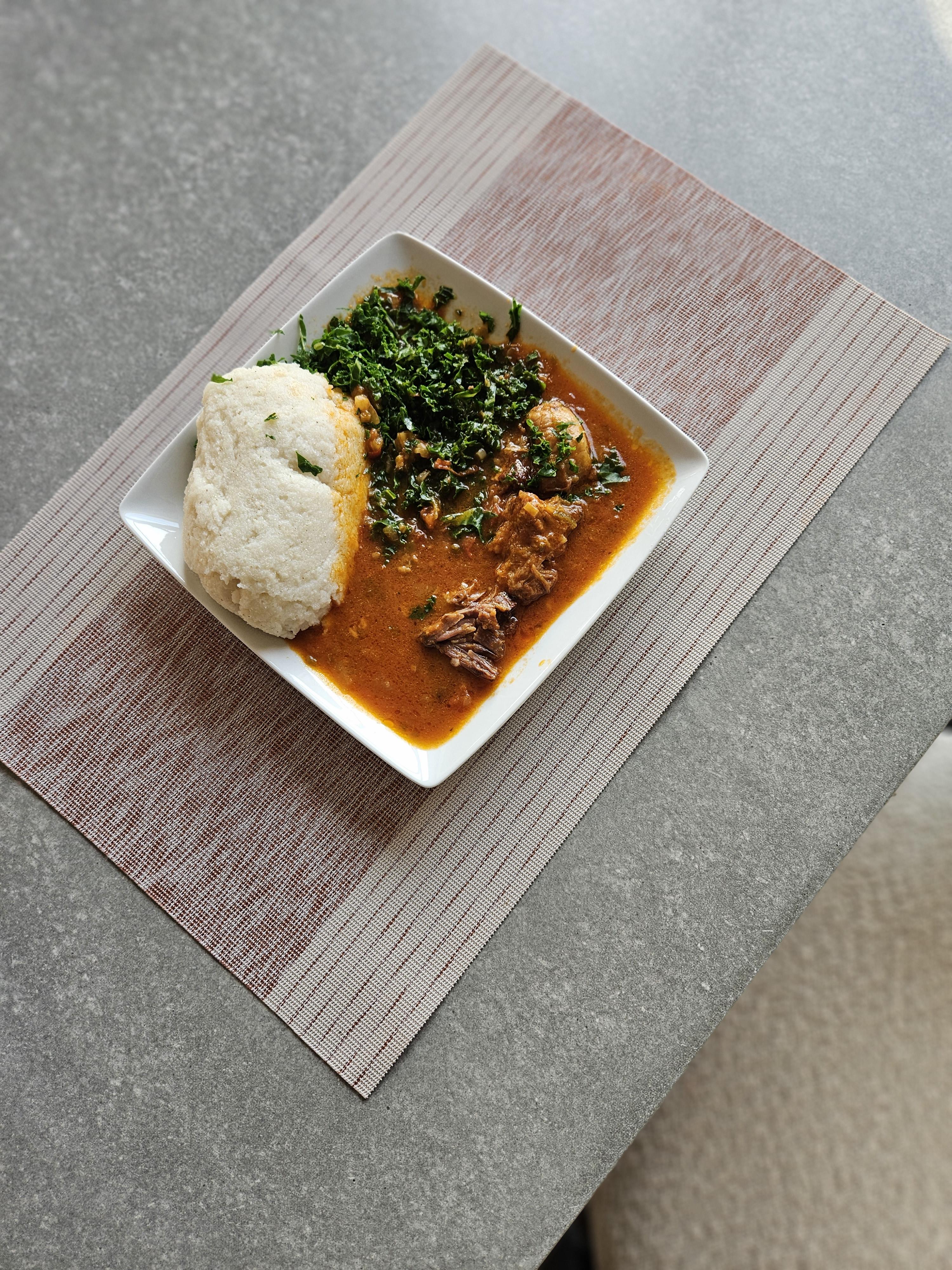 Oxtail soup served with ugali.jpg