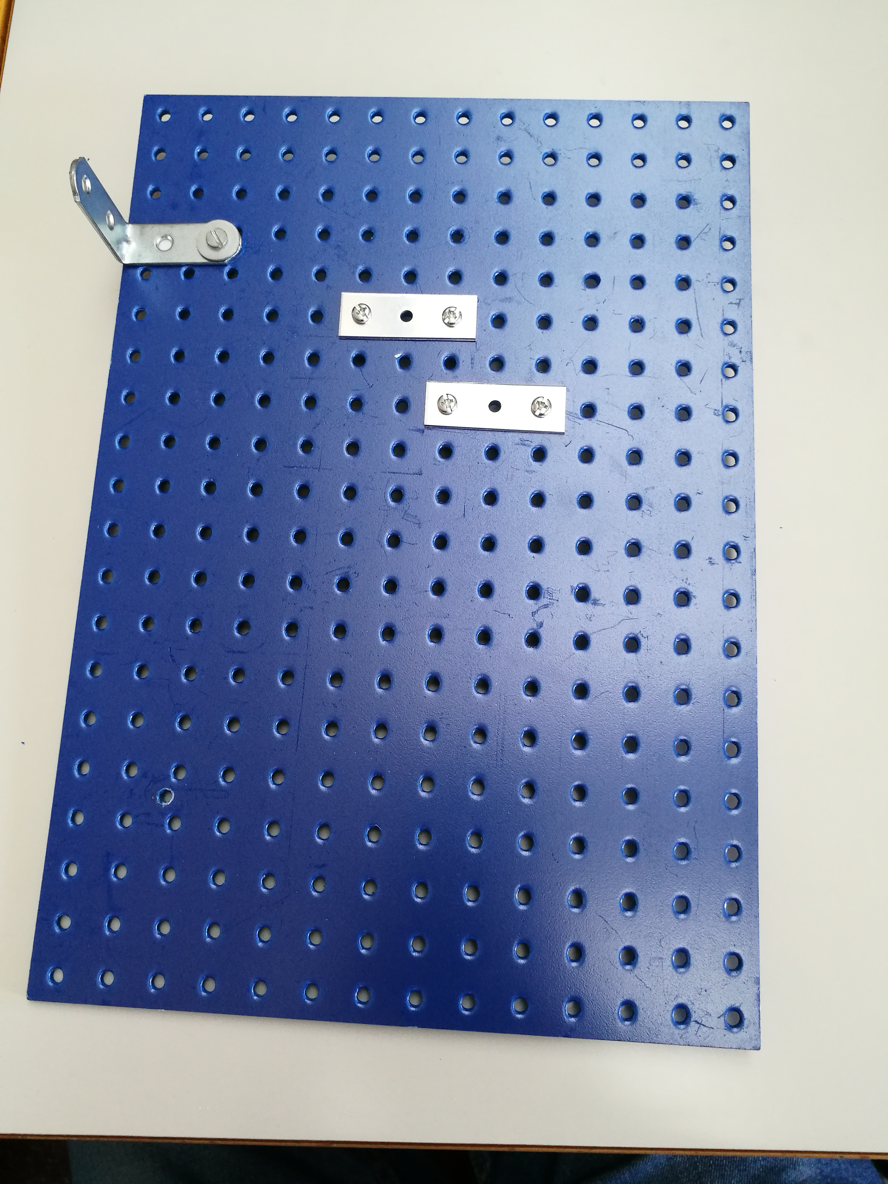 PVC pre-drilled board and some aluminium mending plates.jpg