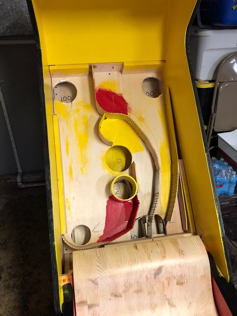 Painting yellow on target assembly.jpg