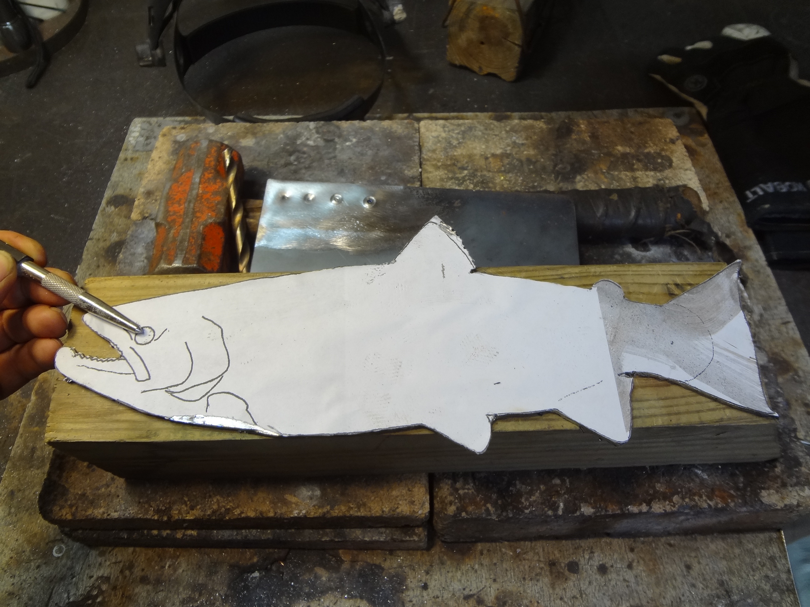 Paste the drawing onto the sheet steel.JPG